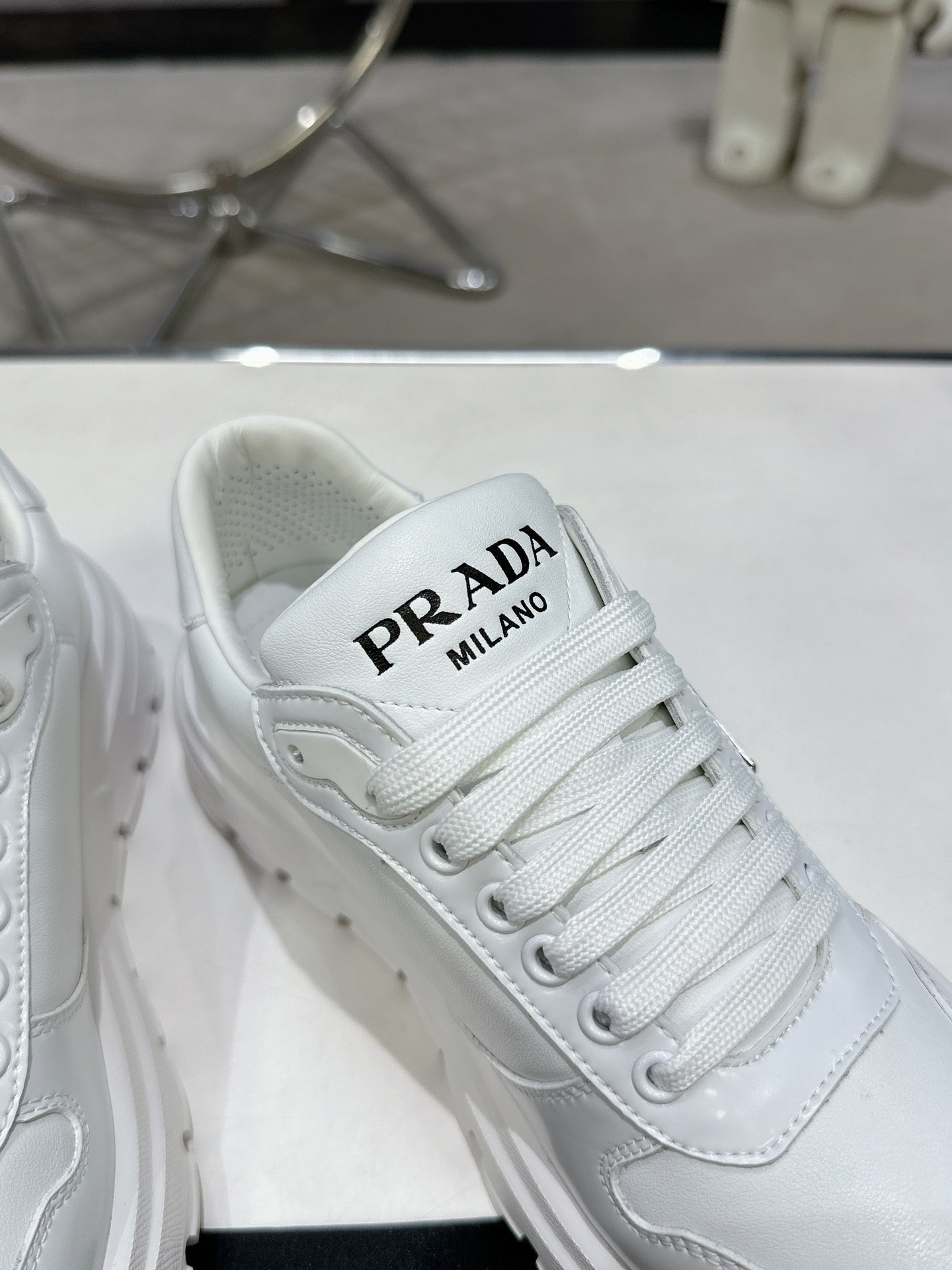 PRD Triangle Logo Leather Sneakers Triple White-046 - fashionupstore1